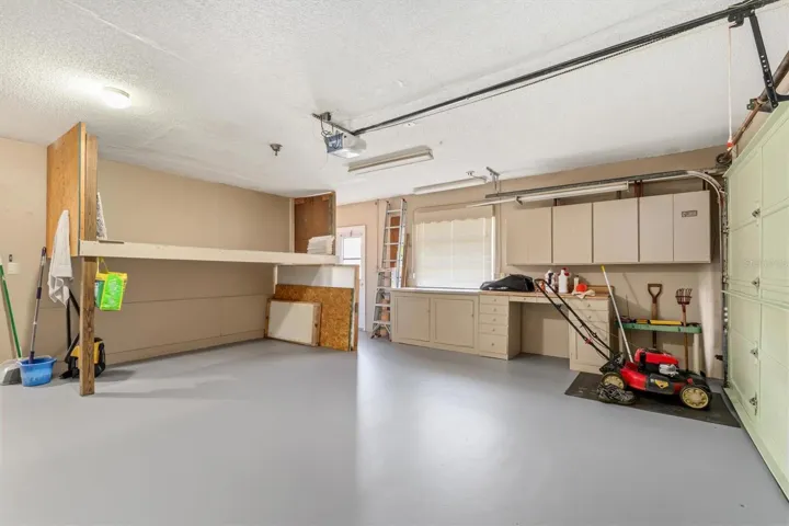 showing off the additional storage in garage