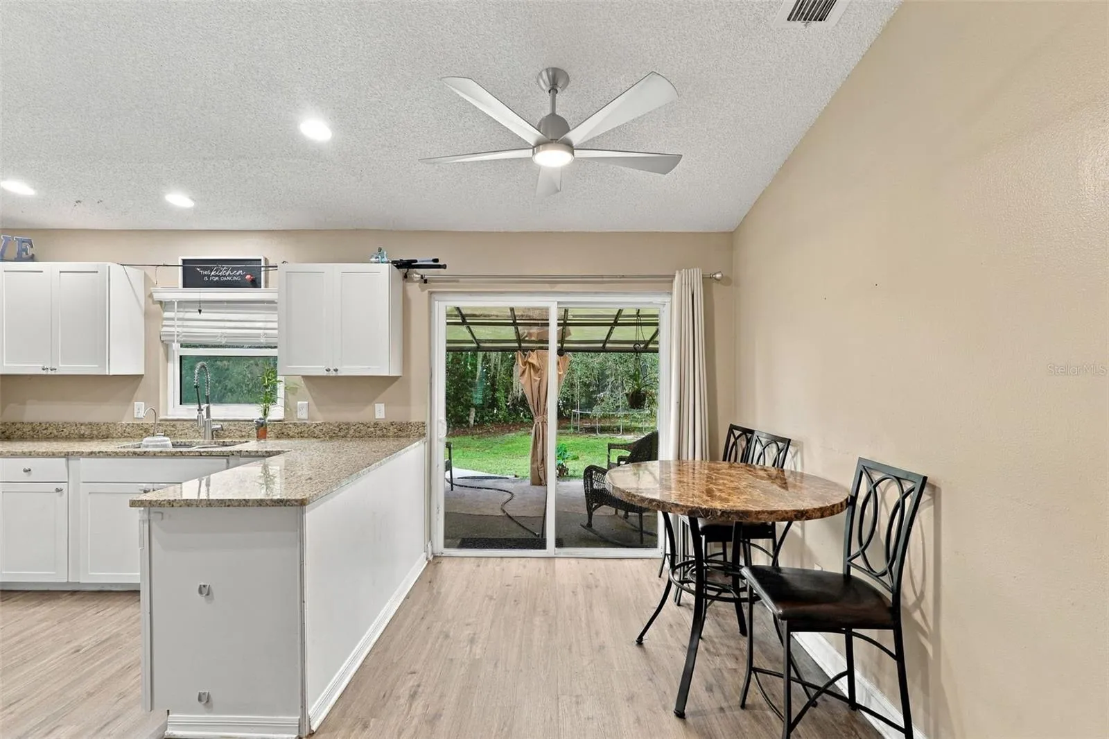 Kiten and breakfast bar with room for a dinette .