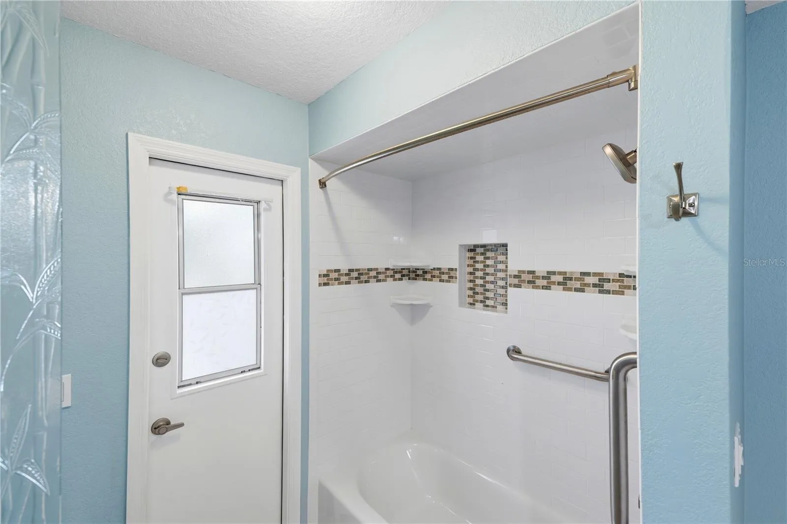 remodeled bathtub/shower combo in the guest bathroom