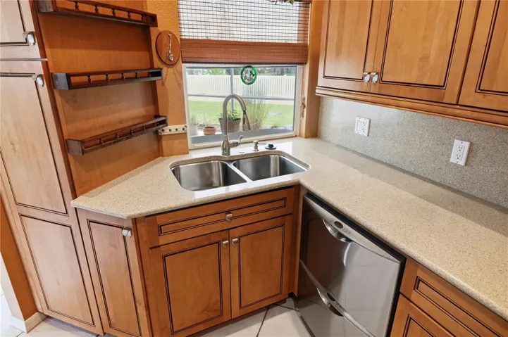 pantry and cabinets feature pullouts and a double dishwasher