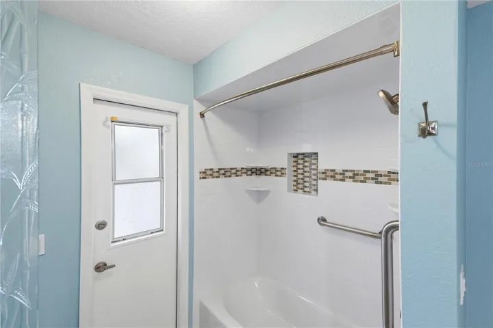 remodeled bathtub/shower combo in the guest bathroom