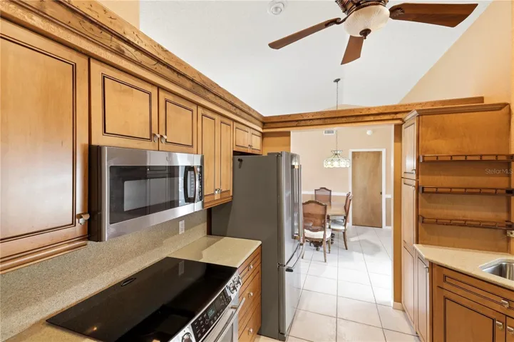 Stunning kitchen with lots of work area.