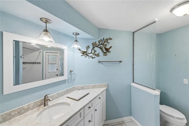 remodeled guest bathroom opens to the lanai