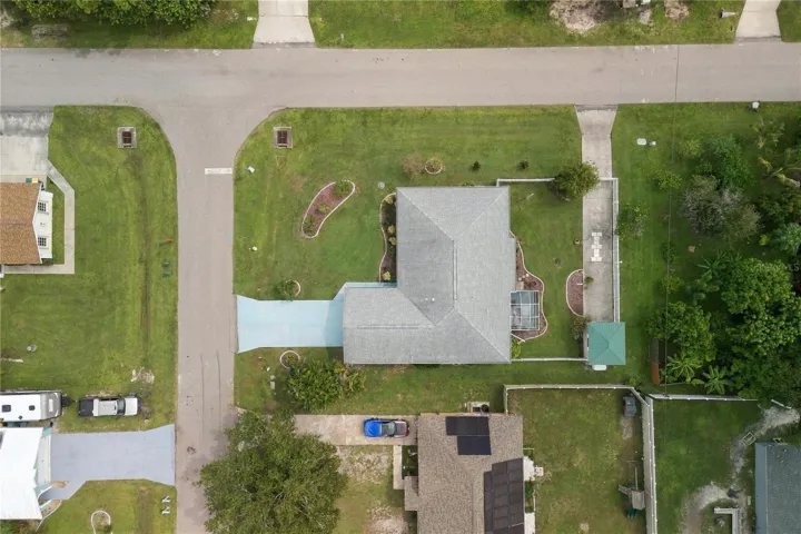 extra driveway parking space leads to the detached backyard shed