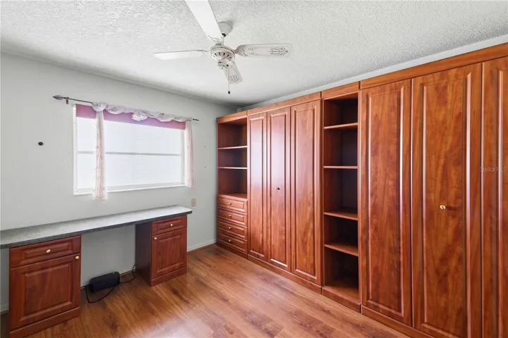 Twin Murphy beds allow this guest room to be enjoyed as a sewing, craft, art room: your choice!