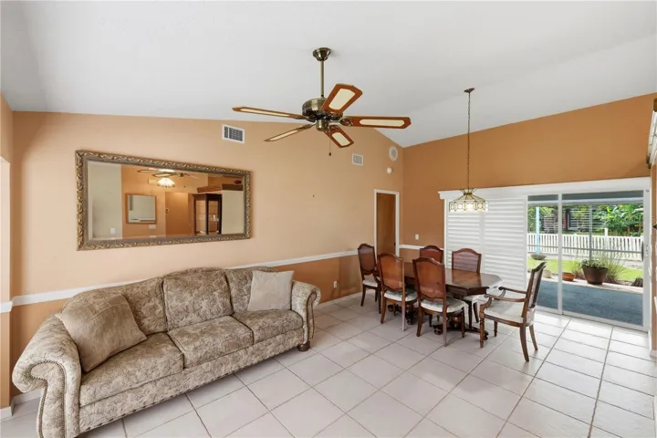Dining room sliders open to the lanai.