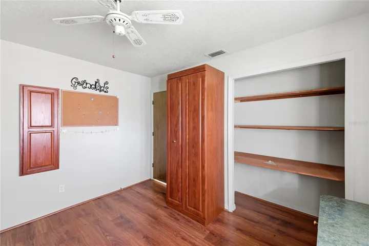 Tastefully-presented multi-functional auxiliary bedroom.