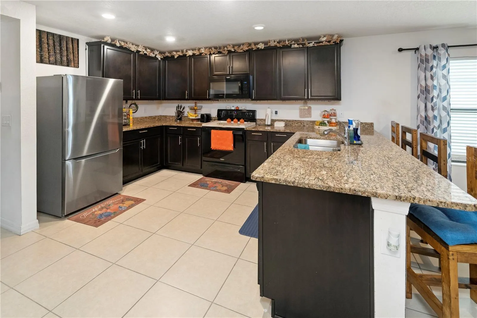 Large Open Kitchen with bar and seating