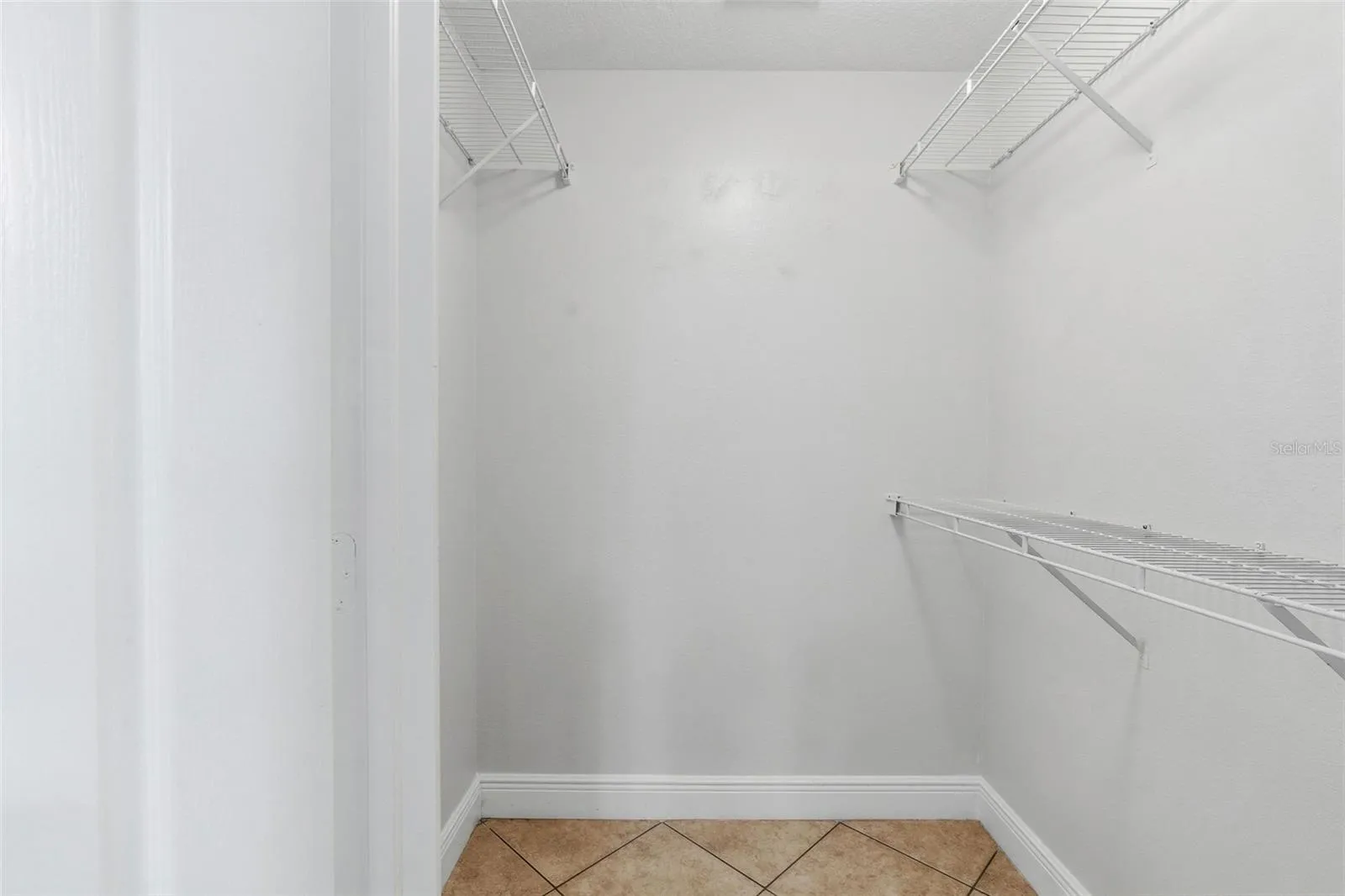 MASTER BEDROOM WALK IN CLOSET