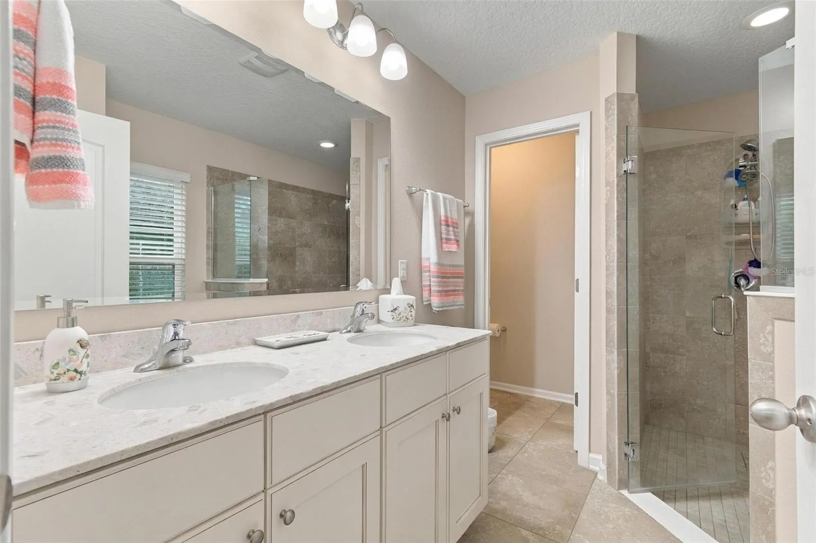 Separate shower stall and WC in primary bathroom 2