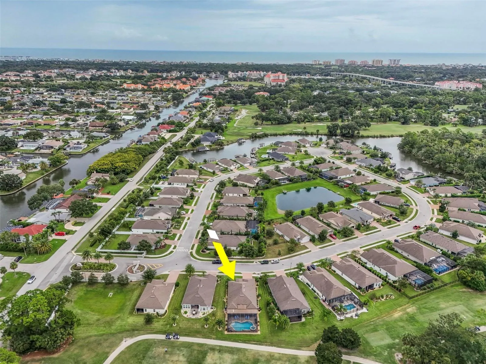Aerial view facing east to European Village, the Atlantic Ocean and Hammock Beach