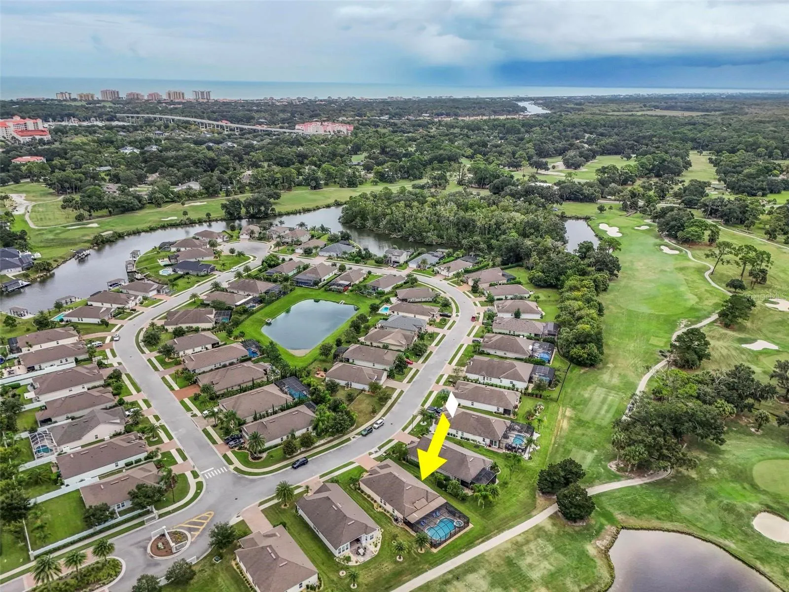 Aerial view facing east to European Village, the Atlantic Ocean and Hammock Beach