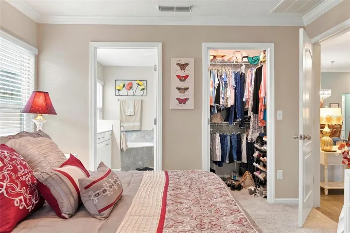 Primary bedroom 1 with walk in closet