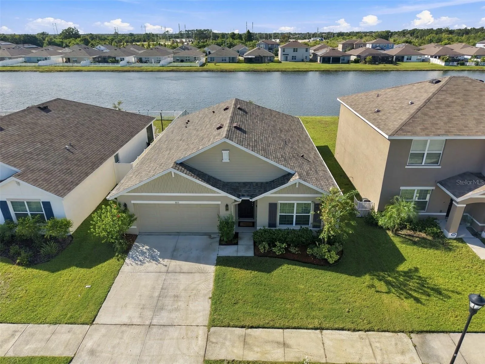Front Aerial and Pond View - 1011 Tidal Rock Ave
