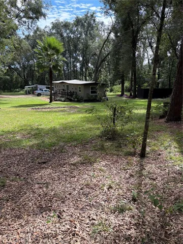 2/2 mobile home with 1/1 rv that can be used for guests, rentable, or friends and family