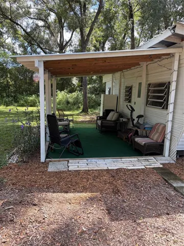 front porch at the rv 15 x 10 metal roof, ready to rent or use as guest house