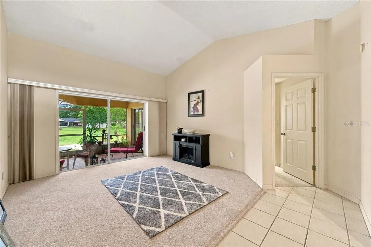 Formal Living Room with Sliding Doors to back screened lanai