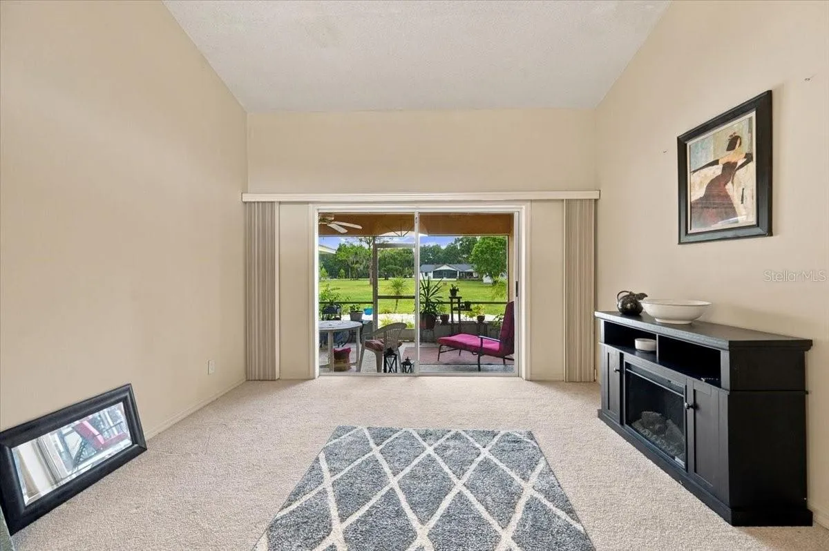 Formal Living room with sliding doors to back screened lanai