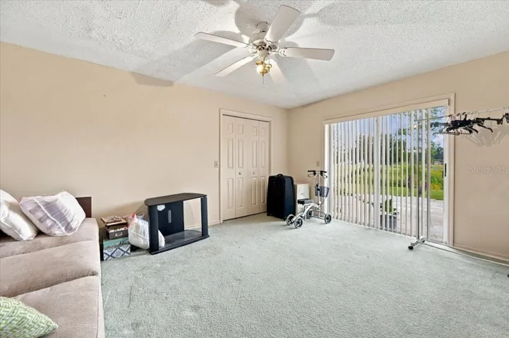 Bedroom 3 with sliding doors to rear patio