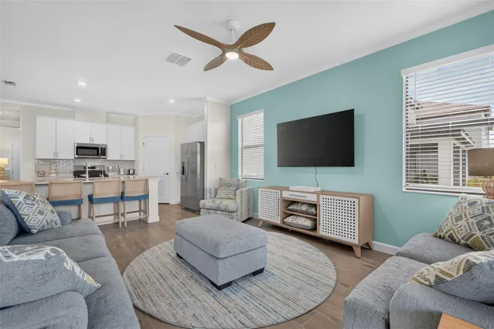 Living Room with large mounted T.V.