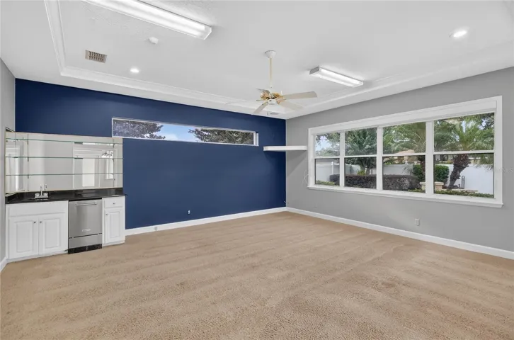 Game Room with Built in Bar area with ice maker