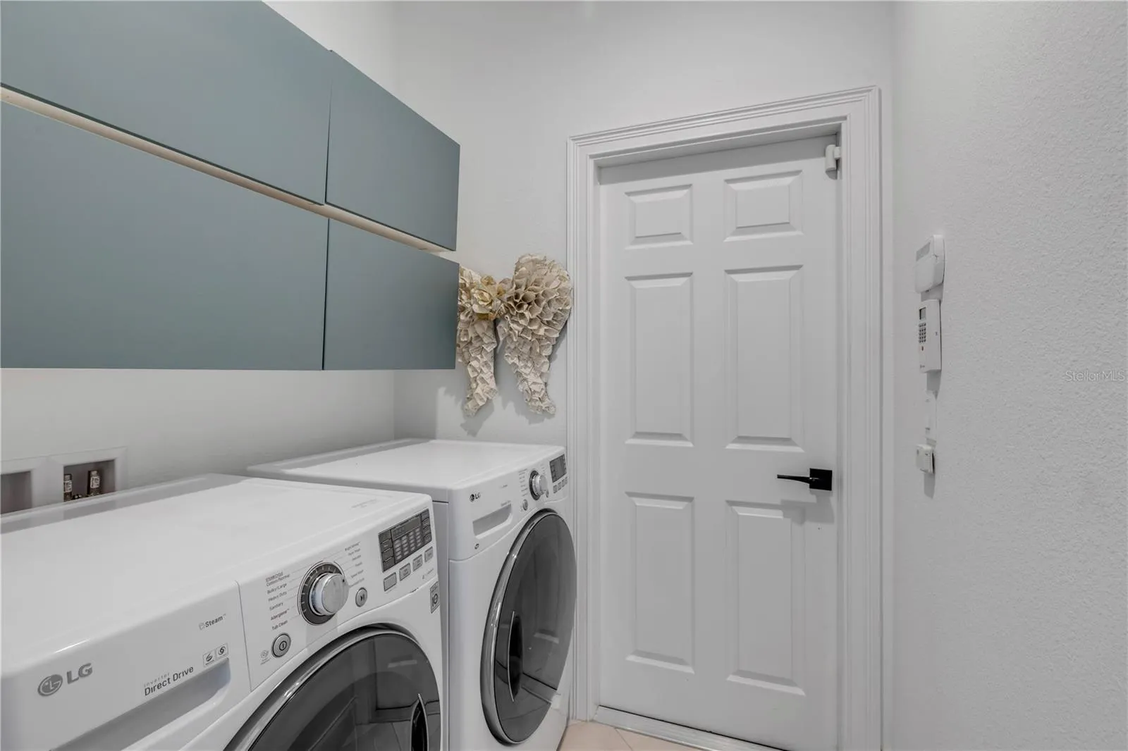 Laundry Room off garage and guest wing.