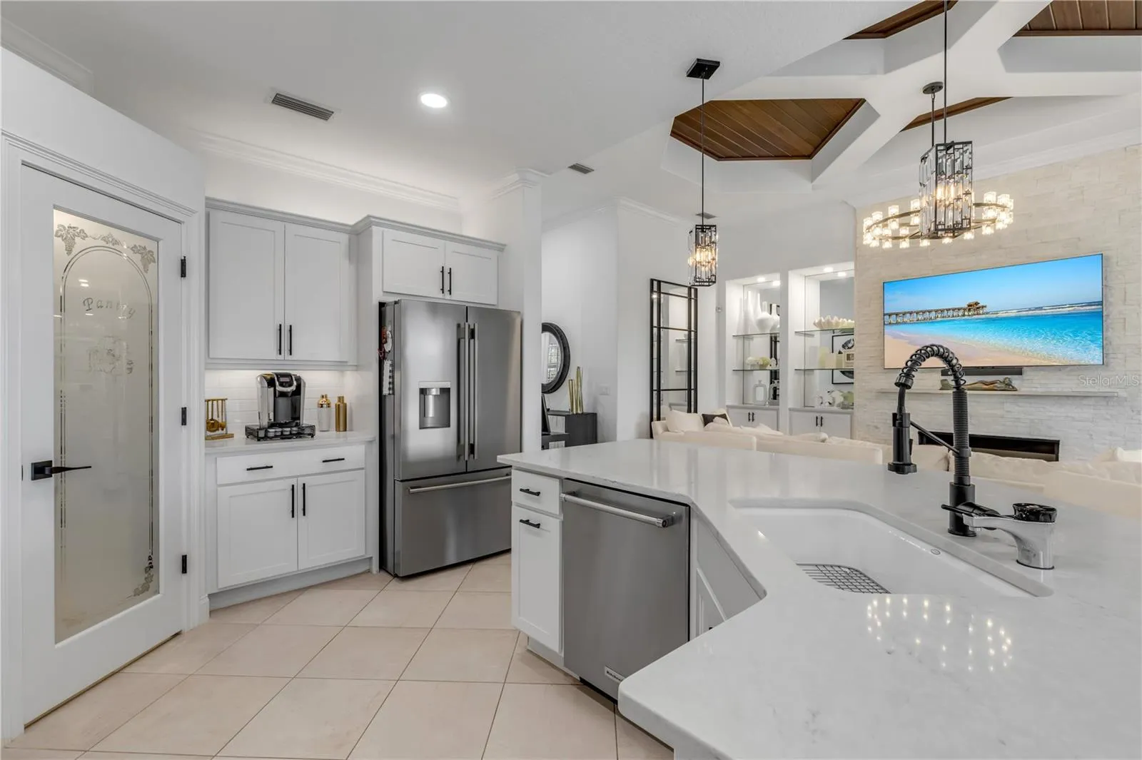 Deep farmhouse style sink and walk-in pantry.