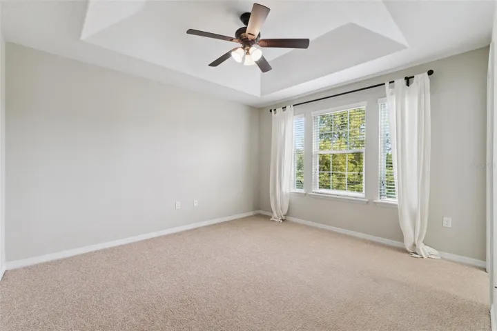 Primary Bedroom with Tray Ceiling Upstairs