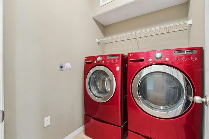 Laundry Room with Shelving on Main Floor