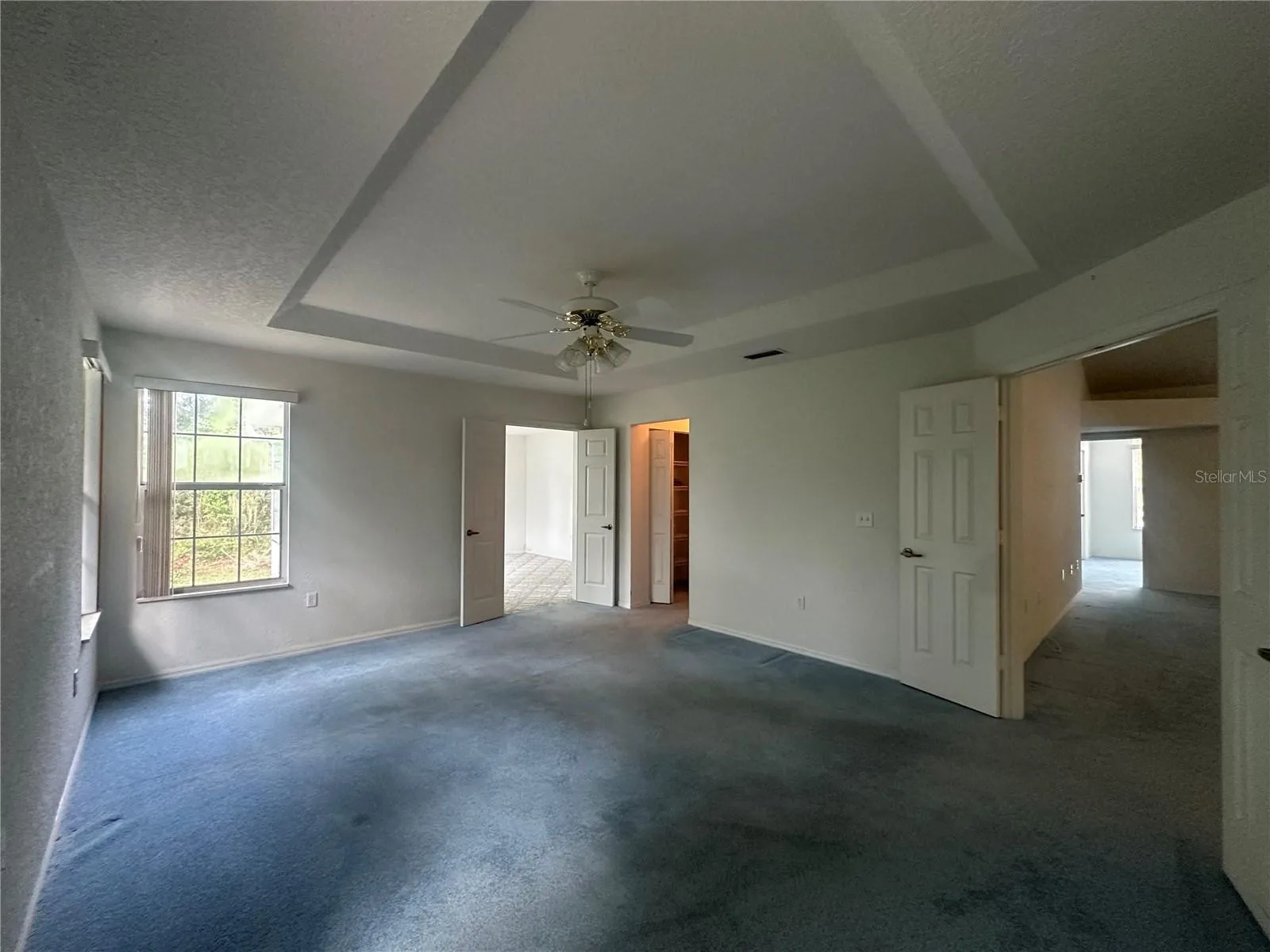 Master Bedroom has tray ceiling & double doors to master bonus room