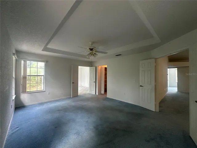 Master Bedroom has tray ceiling & double doors to master bonus room