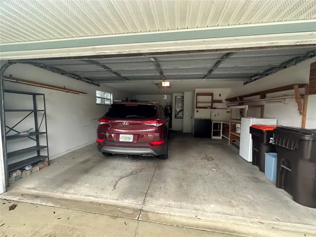 2 car garage with pull down stairs to attic