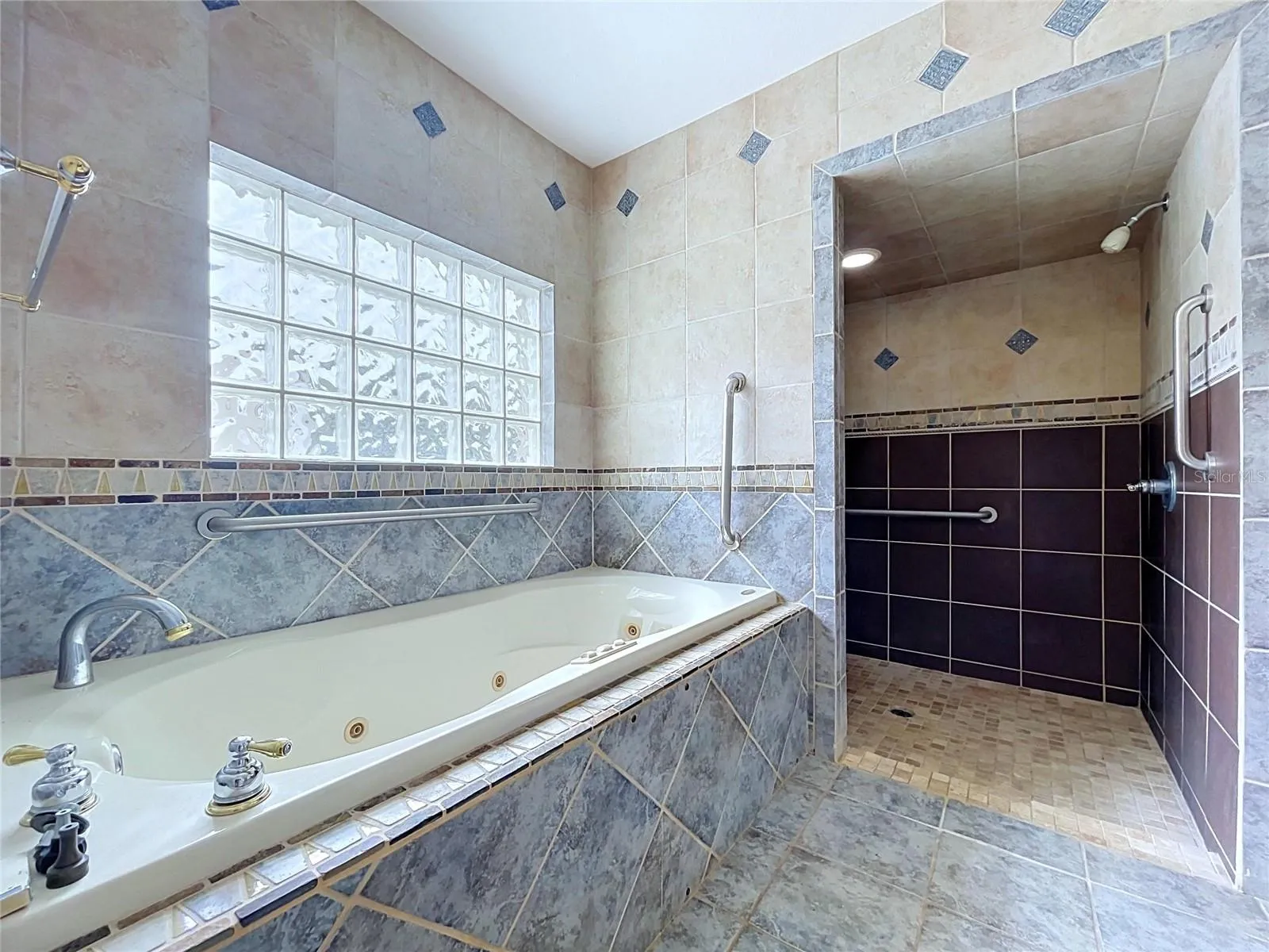 Bathroom 3 Bathtub and tiled shower area