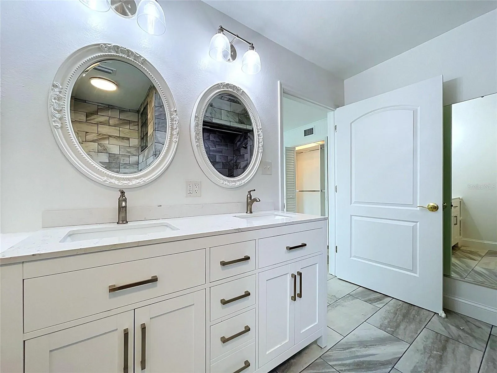 Bathroom 1 vanity with dual mirrors