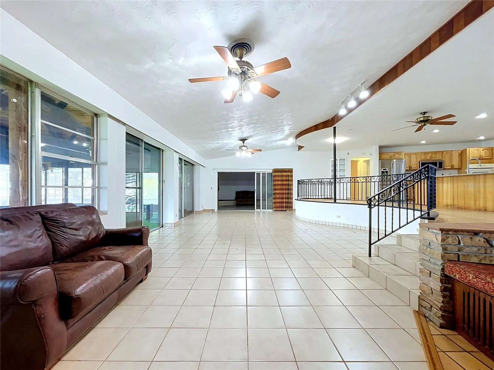 Living area with large windows / sliding glass doors