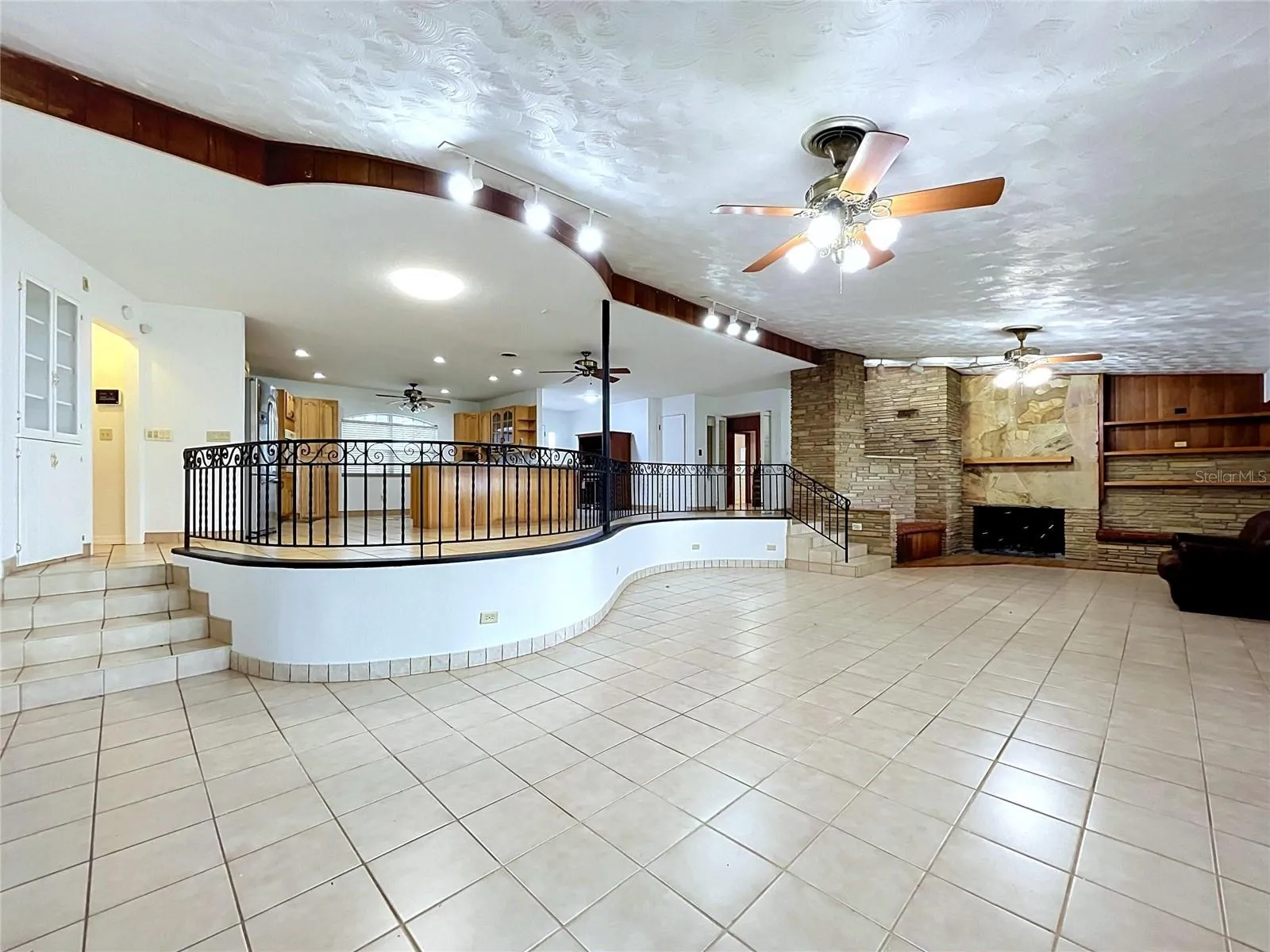 Open living area and adjoining kitchen