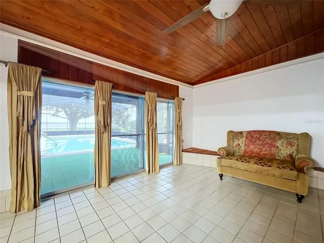 Family room with windows overlooking the lanai and backyard
