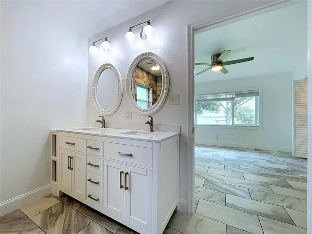 Bathroom 1 vanity and adjoining shower