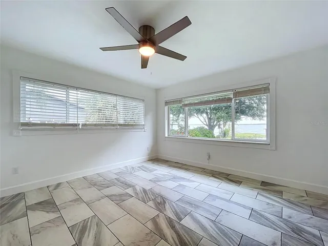 Bedroom 1 with windows on two walls