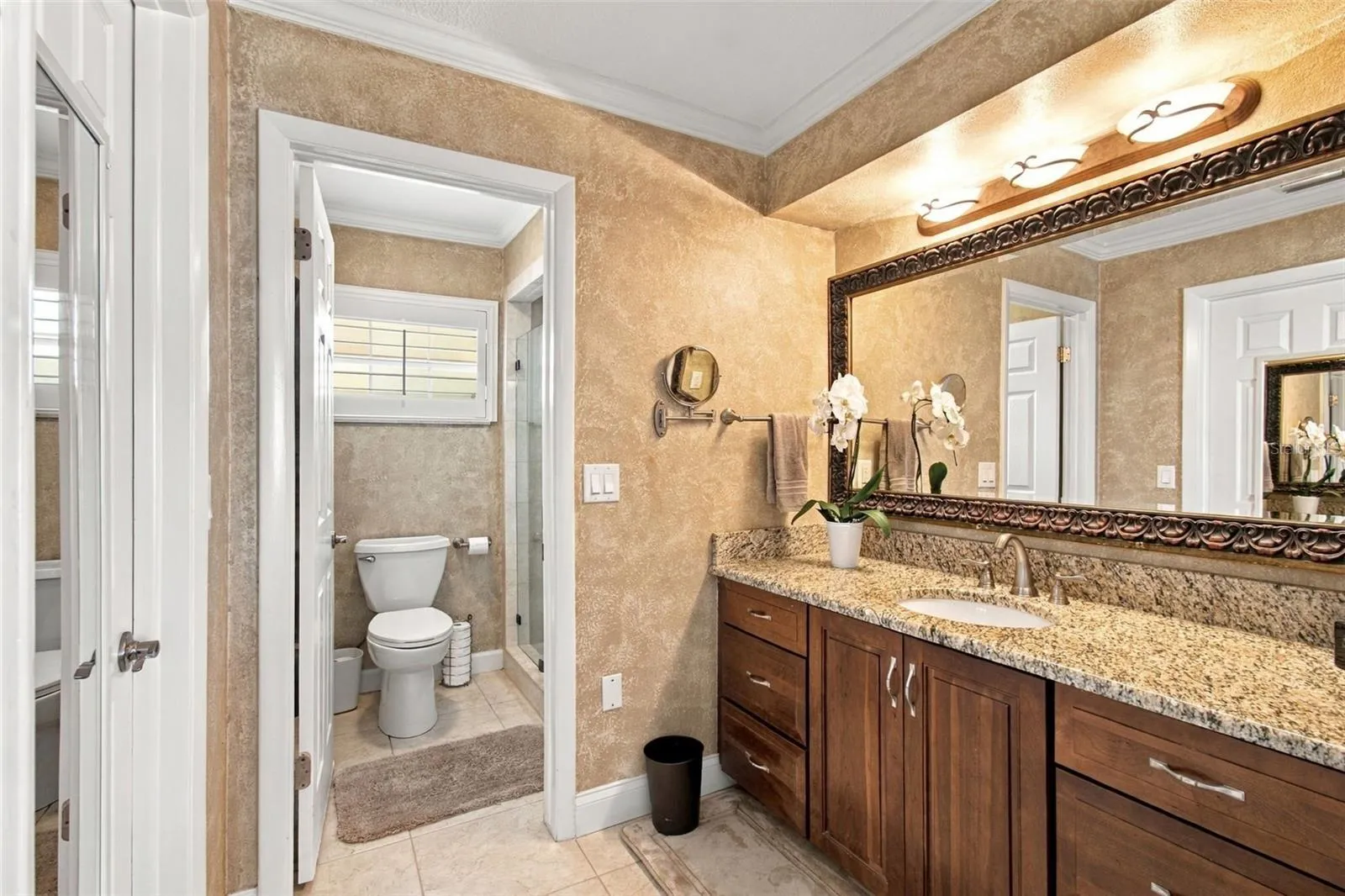 Primary bathroom - Granite countertops, double sink vanity, large custom closet