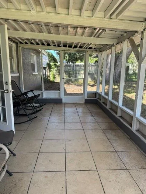 Covered back porch off dining room