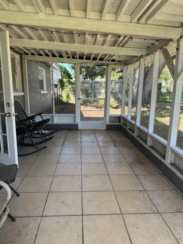 Covered back porch off dining room