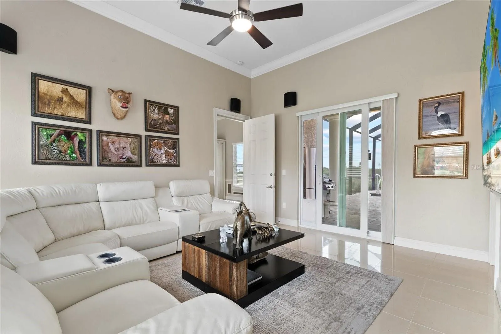 A short hallway from the family room leads to a media room