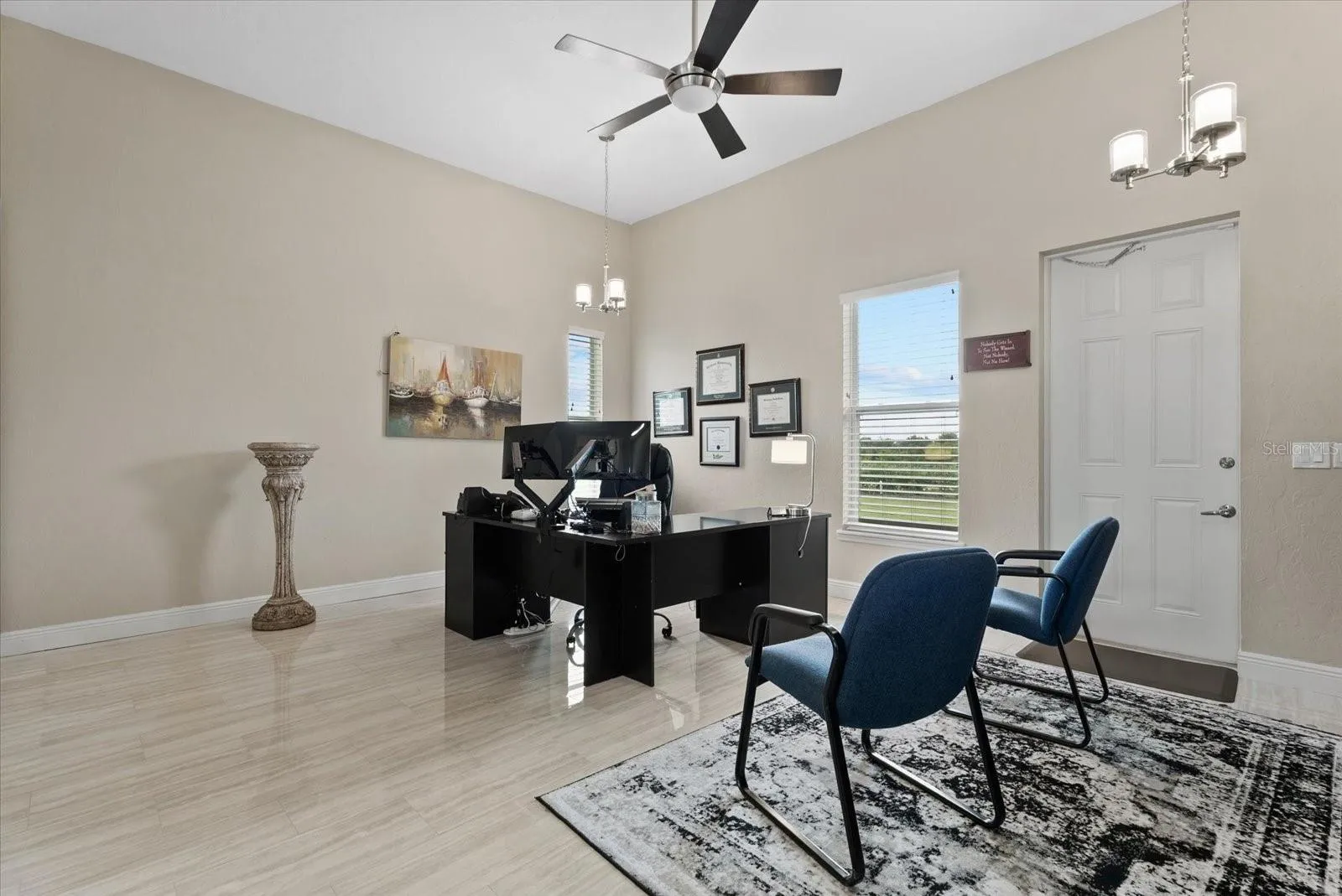 The inlaw suite is currently used as an office.  This room could be the living/dining room, if the conference room is staged as a bedroom