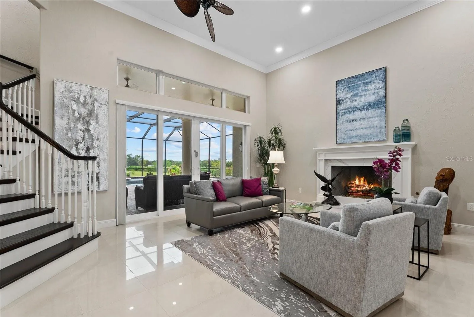 A gas fireplace provides a cozy setting for the a large living room