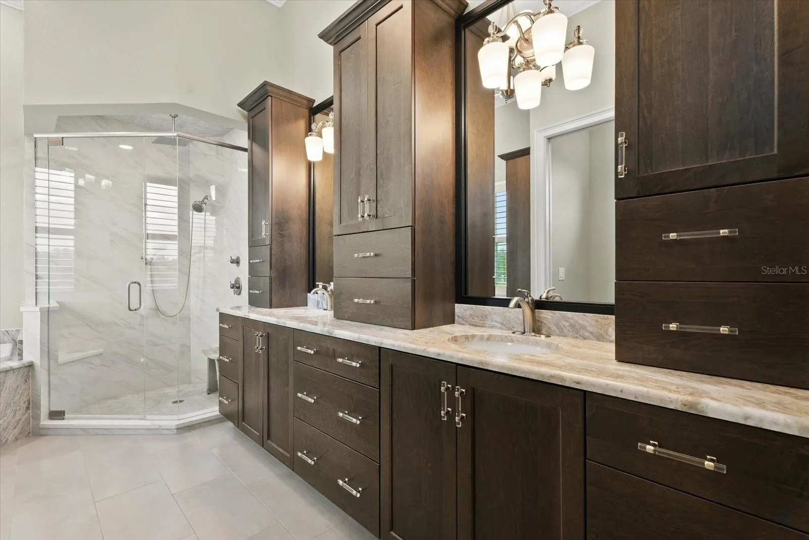 Storage, storage and more stoarage in the primary suite's ensuite bath