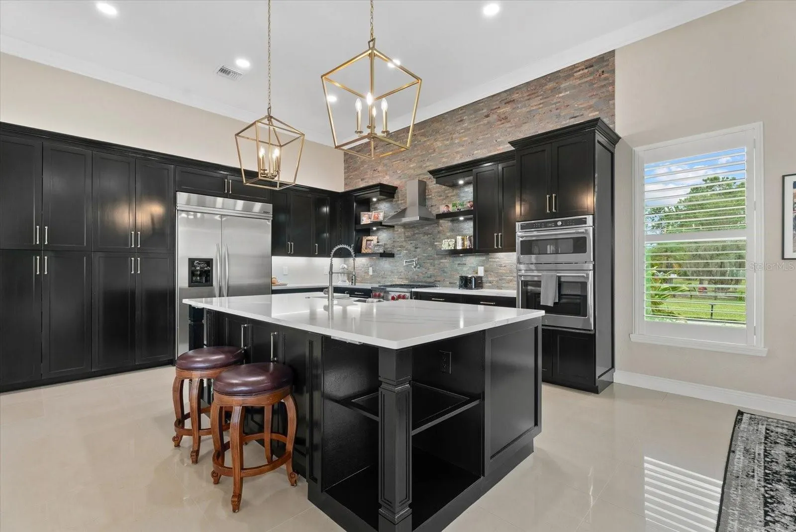 The is a wealth of counter space and enclosed cabinets in the freshly updated kitchen