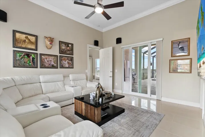 A short hallway from the family room leads to a media room