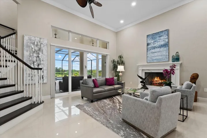 A gas fireplace provides a cozy setting for the a large living room