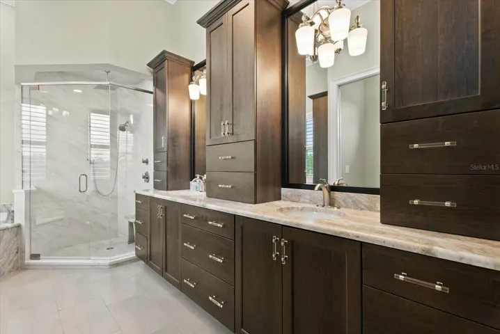 Storage, storage and more stoarage in the primary suite's ensuite bath